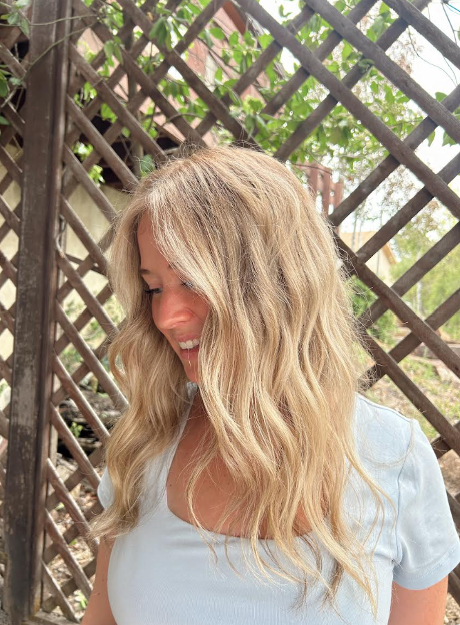 Soft dimensional blonde color with natural waves