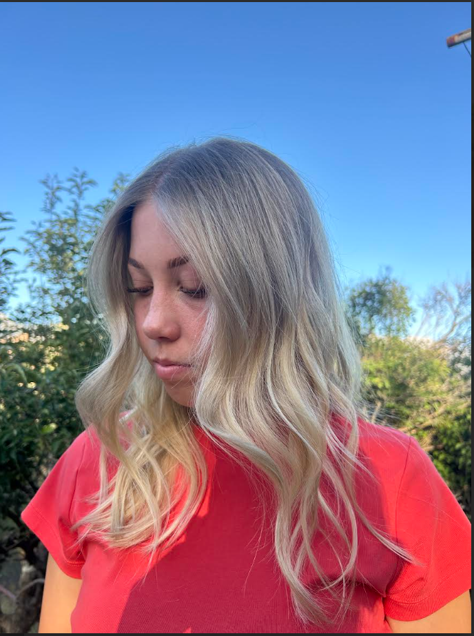 Soft blonde waves with a natural blended finish