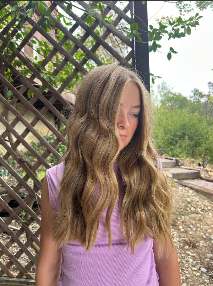 Layered haircut with long soft waves